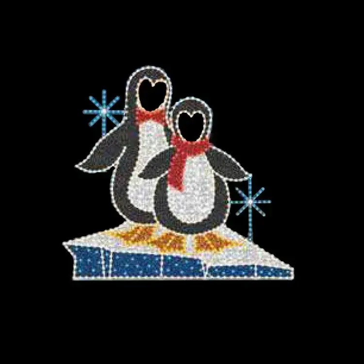LED penguin look-through photo-op display lit at night