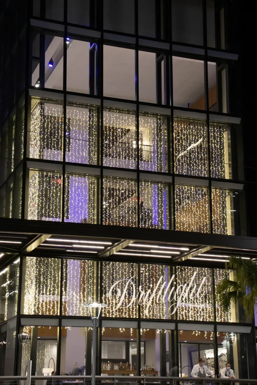 Illuminated commercial holiday display lighting a public space