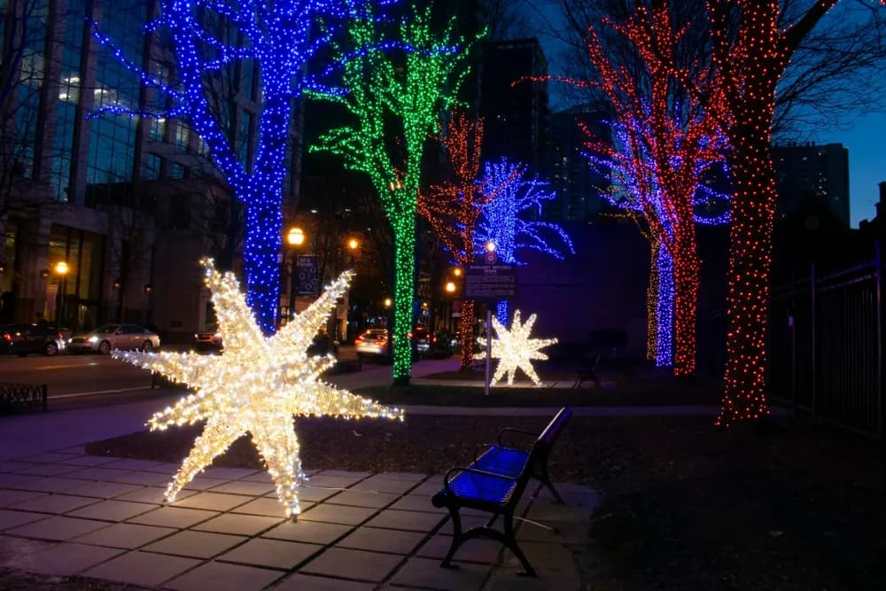 Illuminated commercial holiday display lighting a public space