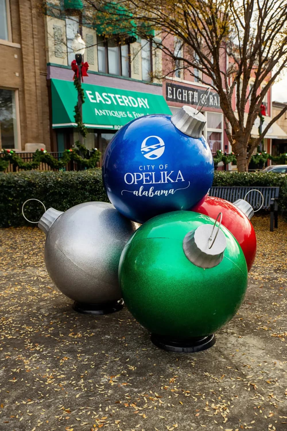 Oversized commercial Christmas ornament display on a plaza