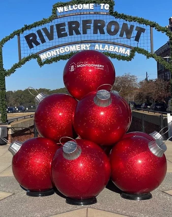 Oversized commercial Christmas ornament display on a plaza